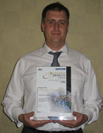Simon Timperley accepts the E-commerce Award on behalf of the SaferPak Team.